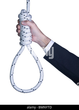 A man on a suit holds a hangman's noose isolated over a white background. Stock Photo