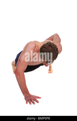 Man doing a one handed push up isolated on a white background Stock Photo