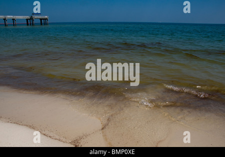 Tar washes up along Alabama Coast, Orange Beach, during 2010 BP oil spill. Stock Photo