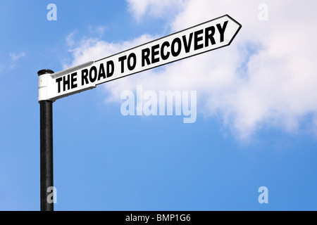 Concept signpost image for the saying The road to recovery. Good image for healthcare or financial related themes. Stock Photo