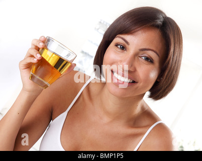 Girl drinking apple juice Stock Photo: 55708345 - Alamy