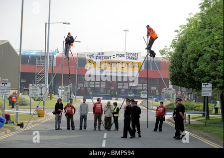 Protesters blockade Manchester Airport Freight Terminal Manchester UK against Airport Expansion and climate change damage Stock Photo