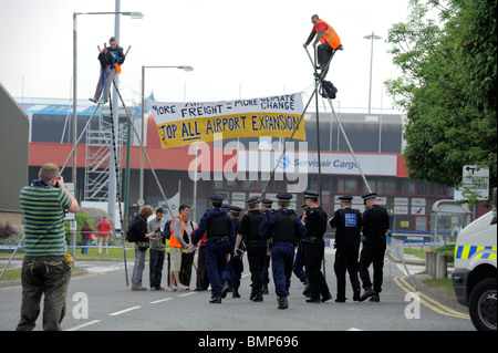 Protesters blockade Manchester Airport Freight Terminal Manchester UK against Airport Expansion and climate change damage Stock Photo