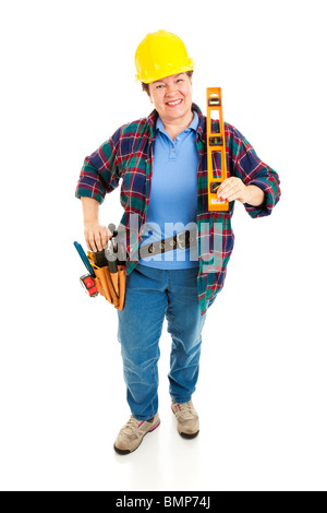 Friendly female construction worker with tools. Full body isolated on white.  Stock Photo
