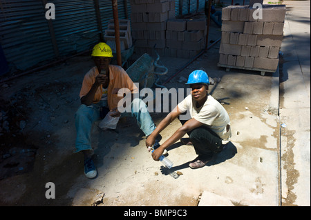African workers on a chinese construction site in Maputo, Mozambique. Stock Photo