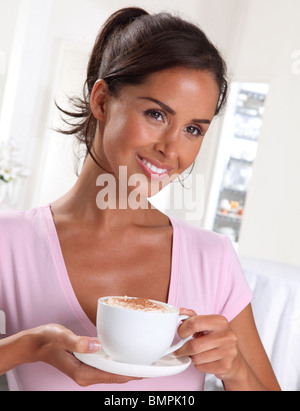 WOMAN WITH CAPPUCCINO