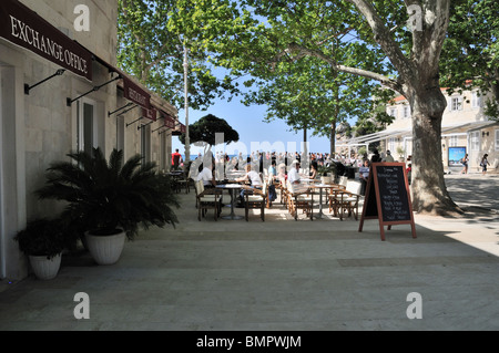 Outdoor diners enjoying the morning sunshine in the popular Brsalje Square, Dubrovnik Stock Photo