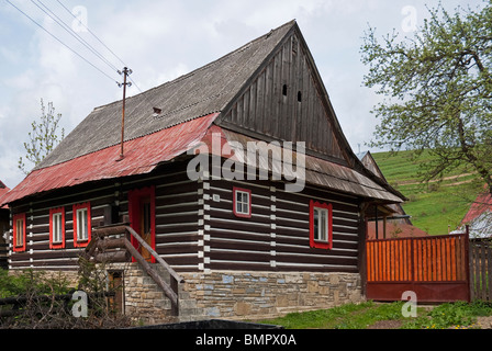 Osturna, Slovakia. Traditional wood house in the town of the Kežmarok District in the Prešov Region of north Slovakia. Stock Photo