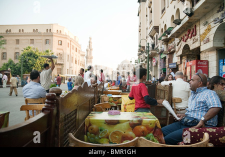 People congregating in the restaurants and cafes of the Islamic quarter, Cairo, Egypt Stock Photo
