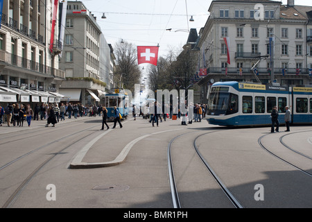 Paradeplatz with people and tram around the corner, Zurich, Switzerland Stock Photo