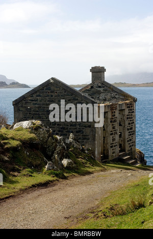 The old pier and building at Aird on the Craignish Peninsula Argyll Scotland Stock Photo