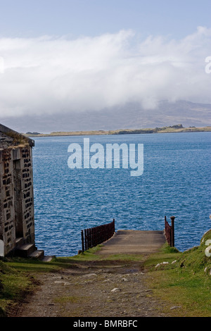 The old pier and building at Aird on the Craignish Peninsula Argyll Scotland Stock Photo