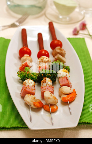 Mixed skewers. Recipe available. Stock Photo