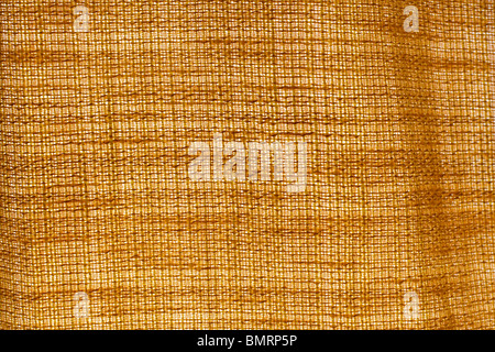 Backlit background texture of a brown curtain Stock Photo