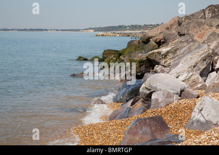 rocks protecting the cliffs from erosion at Barton on Sea in Hampshire Stock Photo