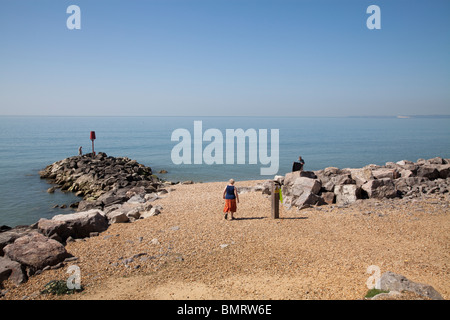 Rock stone groynes sea defences at Barton on Sea Stock Photo