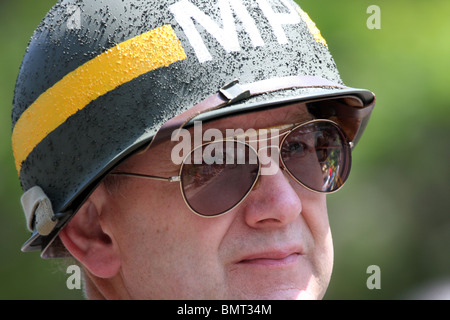 A MP military police man in a helmet Stock Photo