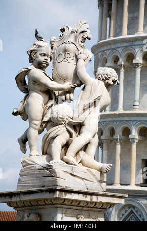 Pisa - angles sculpture and hanging tower Stock Photo