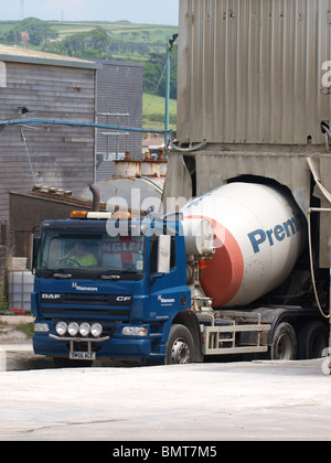 Cement lorry filling up, UK Stock Photo