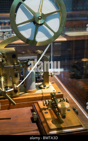 Ancient morse code telegraphy device isolated on a white background ...
