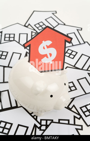 home sign and piggy bank , Real Estate Concept Stock Photo