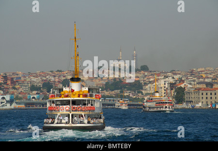 ISTANBUL, TURKEY. Bosphorus ferries entering the Golden Horn on their way to the ferry terminals at Eminonu and Karakoy. 2009. Stock Photo