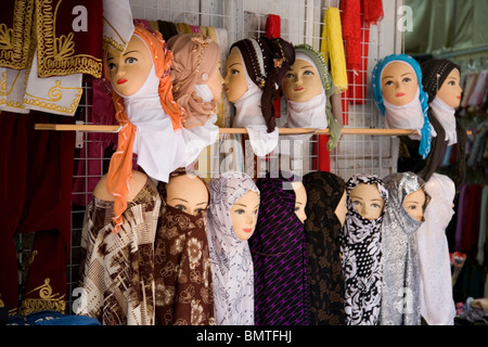 Dummy heads showing Islamic Head Scarves for sale in Jerusalem - Muslim Quarter Stock Photo