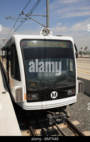 Gold line light rail train parked at Sierra Madre station in Los Angeles County Stock Photo