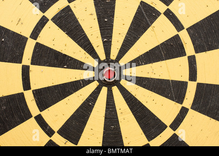 Closeup detail of a heavily used darts board Stock Photo