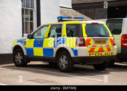 Police car parked in a hotel / pub car park in the lakes. Stock Photo