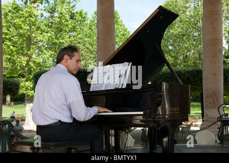 Piano player at Spa in Montecatini Tuscany Italy-1 Stock Photo