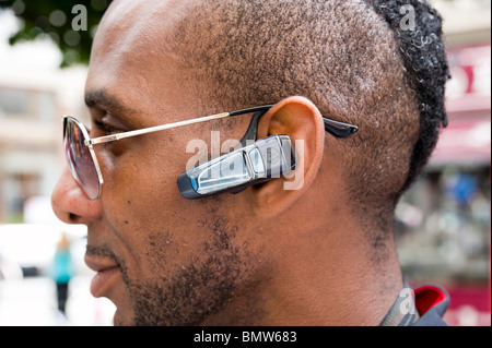 Bluetooth mobile phone headset, London, England, Britain, UK Stock Photo