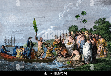 James Cook landing in the Friendly Islands, greeted by Tonga natives bearing fruit, 1770s. Hand-colored woodcut Stock Photo