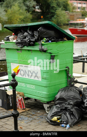 An overflowing Onyx wheelie bin Stock Photo