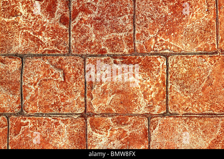 on-site printed concrete cement pavement texture red brown clay replica  Stock Photo