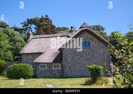 Traditional Thatched roof Cottage in Merthyr Mawr near Bridgend Wales UK Stock Photo