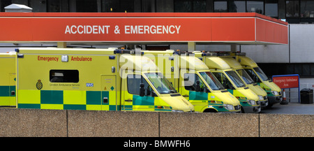 Row of London ambulances at NHS hospital entrance to Accident & Emergency department at St Thomas Hospital Lambeth in London England UK Stock Photo
