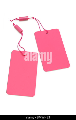 Pink paper price tag or label on white background Stock Photo