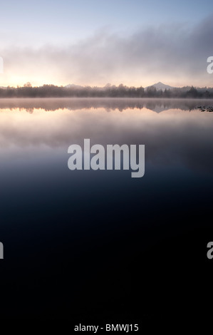 Sunrise Lake Cassidy with Mount Pilchuck reflected in Lake Snohomish County Washington State USA Stock Photo