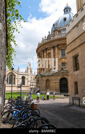 Bicycles parked in Brasenose Lane near the Radcliffee Camera and All Souls College Oxford Stock Photo