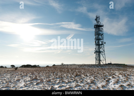 radio and mobile phone mast on a snow covered Butser Hill on the south downs Stock Photo