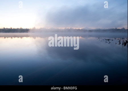 Sunrise Lake Cassidy with fog and Mount Pilchuck with reflections Snohomish County Washington State USA Stock Photo