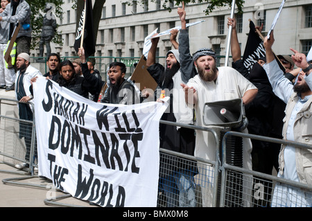 Islamist protestors holding banner 'Sharia Will dominate the World', Sharia Law demonstrators, Whitehall, London, UK, 20th June 2010 Stock Photo