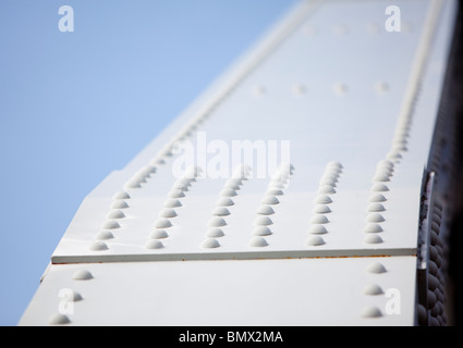 Closeup of a riveted joint in the iron bridge support structure Stock Photo