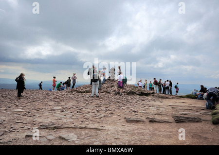 Walkers on the summit of Cribyn in the Brecon Beacons South Wales Stock Photo