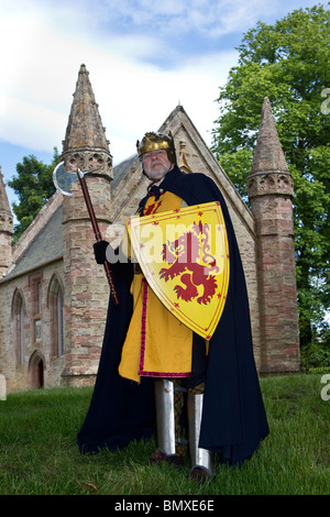 Scottish King Robert the Bruce actor, with shield & axe at Scone Palace, Scotland, UK Stock Photo