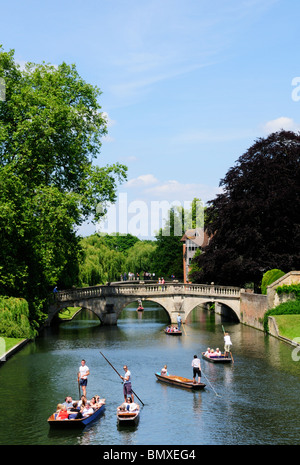 Punting on the River Cam from Kings Bridge looking towards Clare Bridge, Cambridge, England, UK