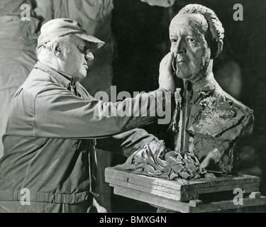 JACOB EPSTEIN ((1880-1959) American born British sculptor in his studio in 1955 Stock Photo