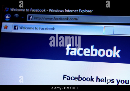 A photograph showing the home page logo of the Internet website Facebook; a popular social networking site on the world wide web Stock Photo