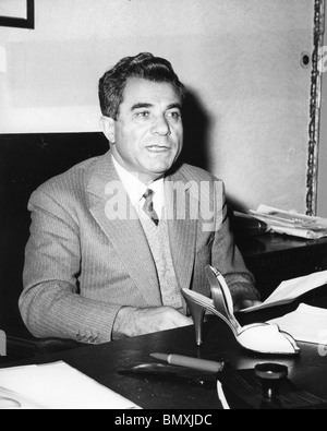 SALVATORE FERRAGAMO (1898-1960) Italian shoe designer at his Via Manelli workshop in Florence about 1955 Stock Photo